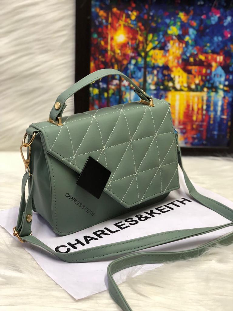 Chic Minimalism: Small Sling with Front Cut Design